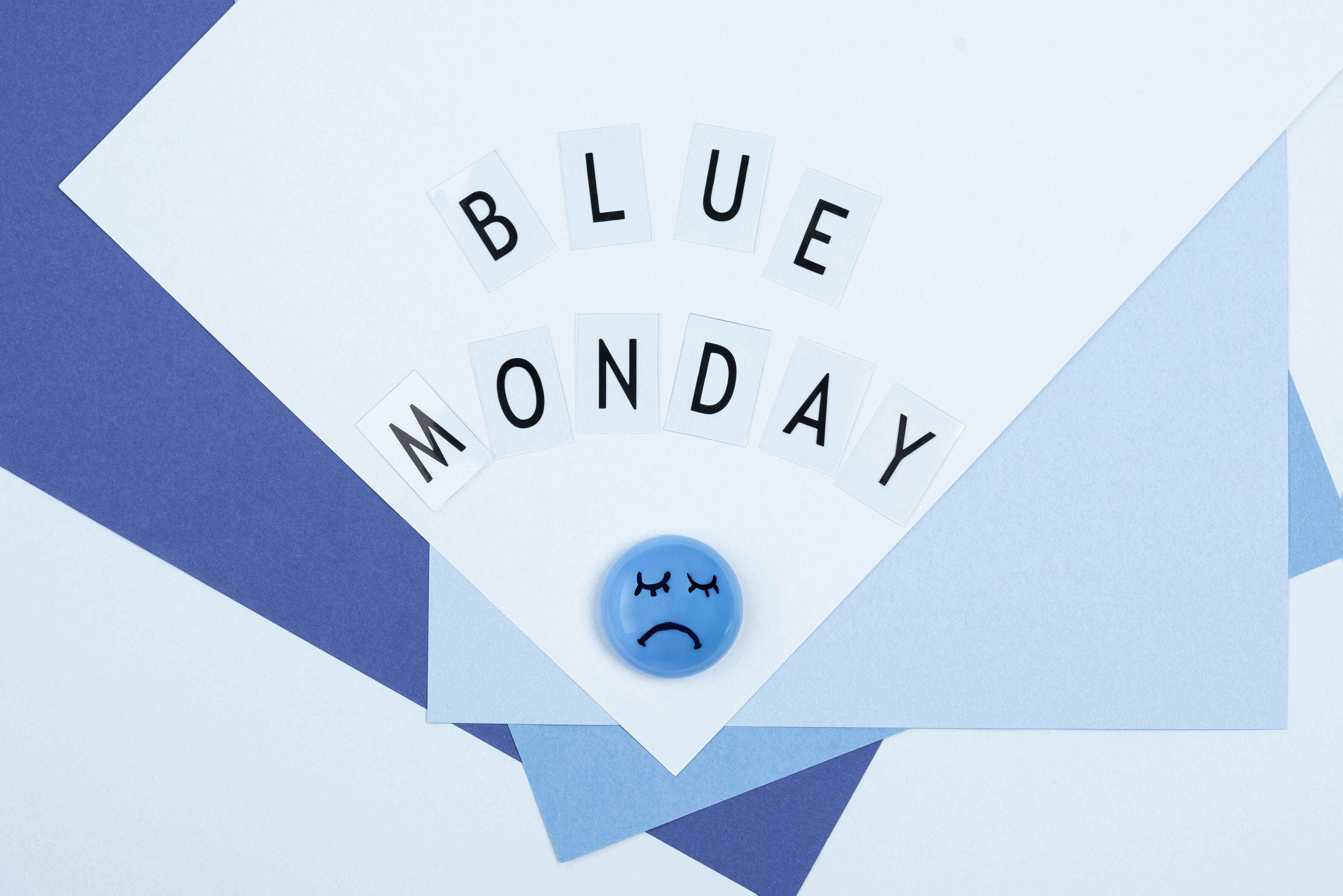 top-view-sad-face-blue-monday (2) (1)