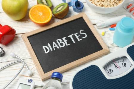word-diabetes-and-diabetic-accessories-on-wooden-b-2023-11-27-04-55-00-utc