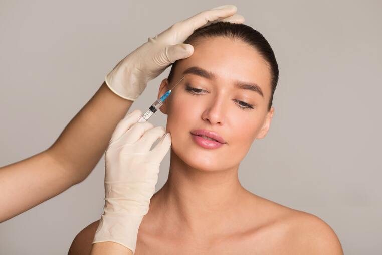 woman-with-perfect-skin-receiving-botox-injection-2021-08-27-23-28-44-utc-min (1)