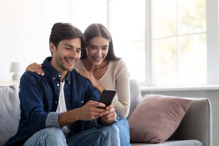 smiling-young-caucasian-man-and-woman-looking-at-s-2021-12-09-19-23-29-utc-min (2)