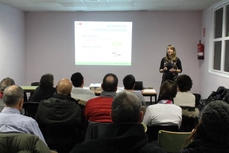 Los asistentes a la charla