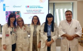 Los dres. Martos y Yuste (1º por la dcha, y en el centro) junto al resto de organizadores y ponentes del taller