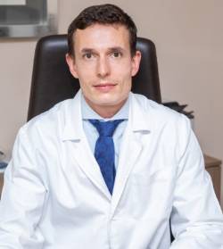 Dr. Carlos Simon