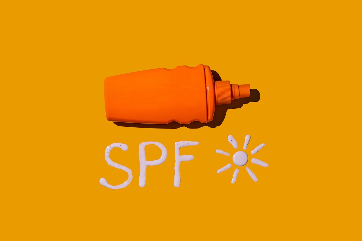 sunscreen-spf-cream-on-yellow-background-2024-10-17-17-13-26-utc