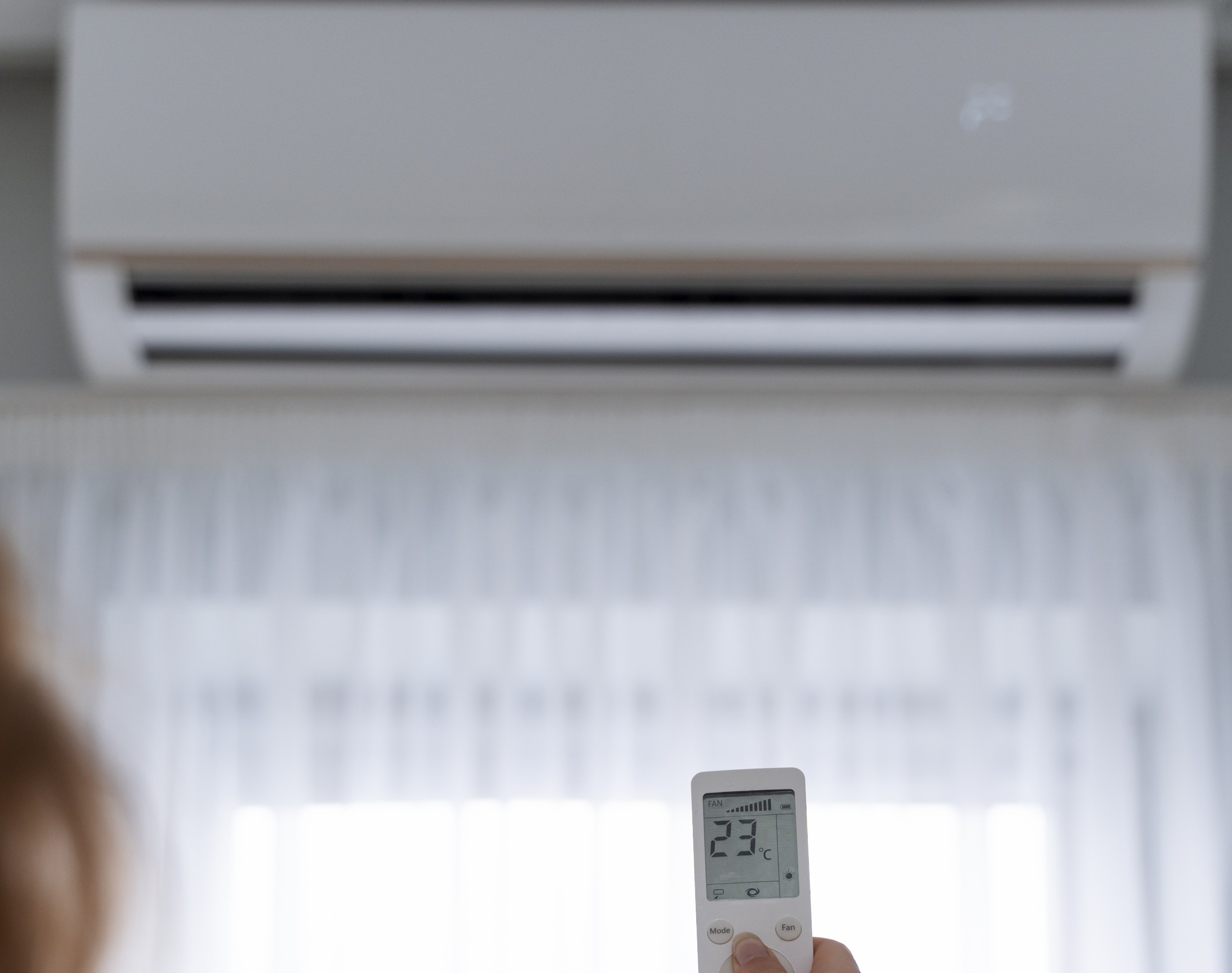 woman-holding-remote-start-heater