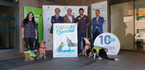 huellasysonrisas_quironsaludmalaga_acuerdoconperrosyequipo_